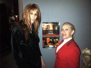 Mistress Cyan and I at Sanctuary-LAX with the IMsL poster Up!